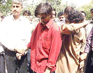 Abid and Javed, suspected to be having links with the ISI, being produced before the Patiala House Court in New Delhi on Tuesday. — PTI photo
