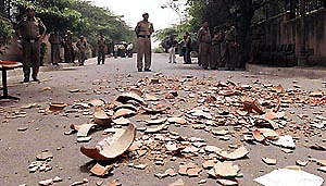 Earthen water vessel broken by the BJP activists at the Delhi Jal Board office in New Delhi on Wednesday in in protest against the shortage of drinking water in the Capital.  PTI photo