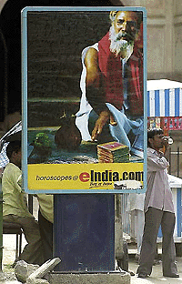 A billboard in New Delhi advertises an Internet site as VSNL hinted at a huge price cut to compete with market-savvy private firms.  AFP