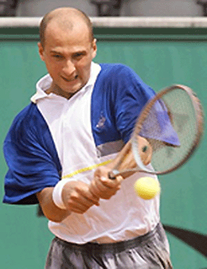 Ukraine's Andrei Medvedev hits a return to Argentina's Agustin Calleri during their 3rd round match on Saturday at the French Open in Roland Garros in Paris. Medvedev won 6-3, 3-6, 6-4, 6-3.  AFPphoto