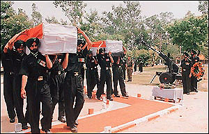 The bodies of two jawans, who were killed in a forward area, being accorded military honours at the northern area in Chandigarh on Saturday.  A Tribune photograph