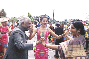 President K. R. Narayanan dances with BJP leader Sushma Swaraj during his visit to Dai village on the outskirts of Kunming on Saturday