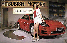 A model shows off a Mitsubishi Eclipse at the Beijing Auto China 2000 car exhibit on Tuesday. Over 430 cars on on display for the exhibit, which opens today and runs until June 12.  AP/PTI photo
