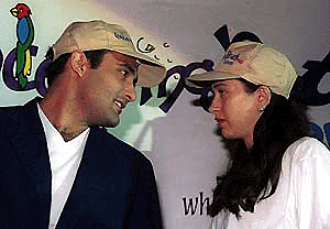 Akshaye Khanna and Karisma Kapoor talk to each other during the launch of  concerningpets.com, a website specialising in domestic animal matters, at a Delhi hotel on Wednesday.   PTI photo 