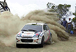    ATHENS : Britain's Colin McRae makes a turn with his Ford Focus WRC at Kineta, Greece in a special stage on the first day of the 47th Acropolis Rally, on Friday.  Some 117 cars began the race from the foot of the ancient Acropolis to kick off the three-day race that covers 1,408 kilometers (875 miles) through central Greece.  McRae finished the day in first place.  AP/PTI