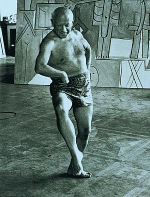 Picasso, striking a dance posture in his studio in France Photo: David Douglas Duncan