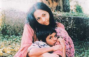Swaroop Sampat-Rava with her son