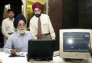 Indias Chief Election Commissioner, Dr M.S. Gill, inaugurates a new website www.getridofglasses.com in New Delhi on Friday. The website, which promotes laser vision correction, aims to bring eye health care closer to the people. The relatively low cost of laser vision correction in India is attracting foreign patients. AFP