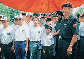 Army officers interect with school children from the remote district of Ladakh