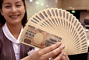Dai-Ichi Kangyo Bank clerk Yukiko Katayama displays a fan of newly-issued 2000-yen banknotes at the bank's main office in Tokyo on Wednesday. The bill, worth $18.5 and featuring the Shureimon gate of Okinawa's Shuri castle on the front, was put into circulation in the day throughout the nation to mark the new millennium and the hosting of the July 21-23 G-8 summit in Okinawa, 1,600 km southwest of Tokyo.  AP/PTI photo