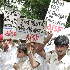 Students display placards during a demonstration in front of Human Resource Development Minister Murli Manohar Joshis residence in New Delhi on Thursday. Scores of students demonstrated against the fee hike in higher education