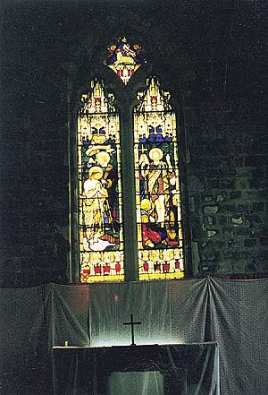 A stained-glass painting depicting a scene from the life St. John
