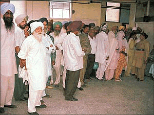 Heavy rush of people outside the DCs office in Ludhiana during the weekly Sangat Darshan.  