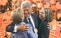 President Bill Clinton is joined by First Lady Hillary and daughter, Chelsea, after addressing the opening session of Democratic National Convention in Los Angeles on Monday night