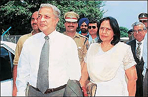 Deposed Prime Minister of Fiji Mahender Chaudhary and his wife arrive at the Chandigarh airport en route to Shimla on Monday.						      A Tribune photograph