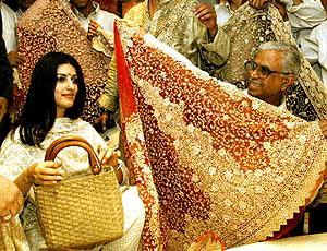 Film actress Twinkle Khanna at a garment showroom after its inauguration by her in New Delhi on Sunday.  PTI photo