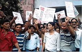 Telecom employees staging demonstration outside telephone bhavan in calcutta in protest against corporatisation of department of telecom services on friday