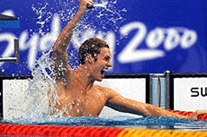 Pieter van den Hoogenband of the Netherlands celebrates winning the gold medal in the men's 200m freestyle on Monday at Sydney