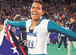 Australias Cathy Freeman  during a victory lap after the womens 400-metre final at the Sydney Olympic.