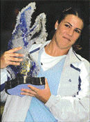 Jennifer Capriati  poses with her trophy after winning the WTA Tour final in Luxemberg on Sunday.