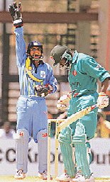 Indian wicketkeeper Vijay Dahiya celebrates as Kenyas Steve Tikolo is dismissed lbw during the opening match of the ICC Knockout 2000 Tournament in Nairobi on Tuesday