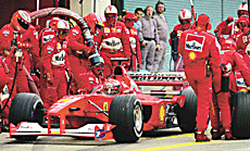 Germanys Michael Schumacher leaves Ferraris pit after making his second pit stop during the Japanese Grand Prix