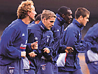 England footballers train at the Olympic Stadium in Helsinki on Tuesday ahead of their World Cup qualifying game against Finland. Howard Wilkinson took over as acting England manager after last weeks defeat by Germany which resulted in the resignation of manager Kevin Keegan. 