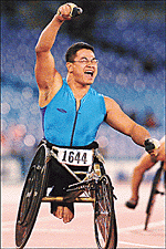 Jung-Hoon Moon from South Korea celebrates as he wins the 400-metre wheelchair final at the 11th Paralympic Games in Sydney on Friday.  AP/PTI