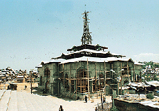 The building under construction. 