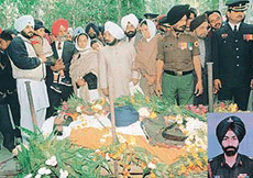 Relatives file past Major Manwinders body.