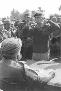 Brigadier Hyat, Commander, 107 Pak Brigade, surrendering to Major General Dalbir Singh.