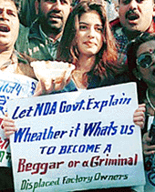 Displaced factory owners and activists of Indian Youth Congress demonstrating at Jantar-Mantar in New Delhi on Monday, against the anti-poor policies of NDA Government. 