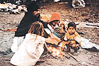 Thawing the cold within  A family celebrates New Year as any other cold day in Ludhiana on Monday.