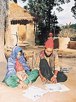 A couple reading textbooks designed by RLEK