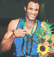 Cubas Felix Savon poses with his gold medal for the 91kg heavyweight class at the Olympic Games in Atlanta. 