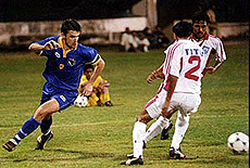 Bosnian captain Dzelaludin Muharemovics dangerous move being thwarted by Bangladesh defenders Firoj Mahmud Hussain (Titu) in their group-2 match in the Sahara Millennium Cup at Kochi on Friday.