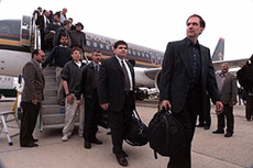 A group of some 20 US activists opposed to UN sanctions against Iraq disembark at Baghdad airport.