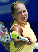 Russias Anna Kournikova plays a forehand return during her fourth round win over Germanys Barbara Rittner at the Australian Open in Melbourne on Sunday.