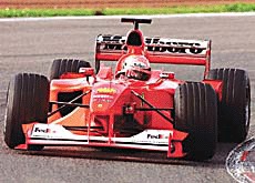 German Formula One driver Michael Schumacher tests his new car at Barcelonas Montmelo racetrack on Tuesday. Schumacher and his Ferrari team are testing the car ahead of the next season.