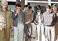 Bookies who organised betting on international cricket matches, are produced before reporters at police station, Sector 17, Chandigarh, on Thursday.