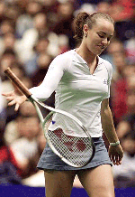 World number one Martina Hingis of Switzerland catches her racket after bouncing it on the court during her semifinal match against Magdalena Maleeva of Bulgaria in the Pan Pacific Open Tennis Tournament in Tokyo on Saturday. Hingis beat Maleeva 6-3, 1-6, 6-0 to advance to the final.