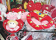 Gift items, including teddy bears, crystal hearts and flower sticks on display in the city for Valentines Day.