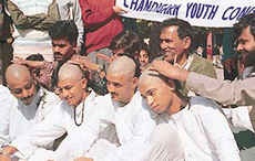 Members of the Youth Congress get their heads shaved in protest against Centres alleged failure to control violence against minorities in Jammu and Kashmir, in Sector 17 piazza, Chandigarh, on Thursday. 