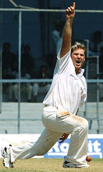 Australian bolwer Shane Warne appeals on the first day of a three-day match between Mumbai and Australia in Mumbai on Thursday.