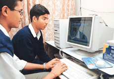 Teenagers prefer cyber cafs to pool joints.  A Tribune photo by Pradeep Tewari