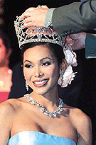 Gun Rumgchao, 25-year-old winner of Thailands third annual Miss Tiffany pageant for Transvestites and Transsexuals, is crowned in the Thai coastal resort town of Pattaya late on Saturday.