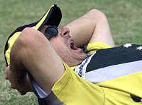 Australian captain Steve Waugh yawns while stretching during a practice session in Visakhapatnam on Monday.