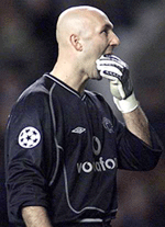 Fabien Barthez, French goalkeeper of Manchester United, wipes his face after the quarterfinal Champions League first leg soccer match against Bayern Munich at Old Trafford on Tuesday.