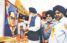 The Chief Minister, Mr Parkash Singh Badal, pays floral tributes to Dr B.R. Ambedkar on his 110th birth anniversary at a state-level function organised in Ludhiana on Saturday.