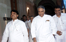 New Delhi: Union Finance Minister Yashwant Sinha, his cabinet colleague Power Minister Suresh Prabhu and Maharashtra Chief Minister Vilas Rao Deshmukh going to attend a meeting on Enron project at North Block in New Delhi on Monday.
